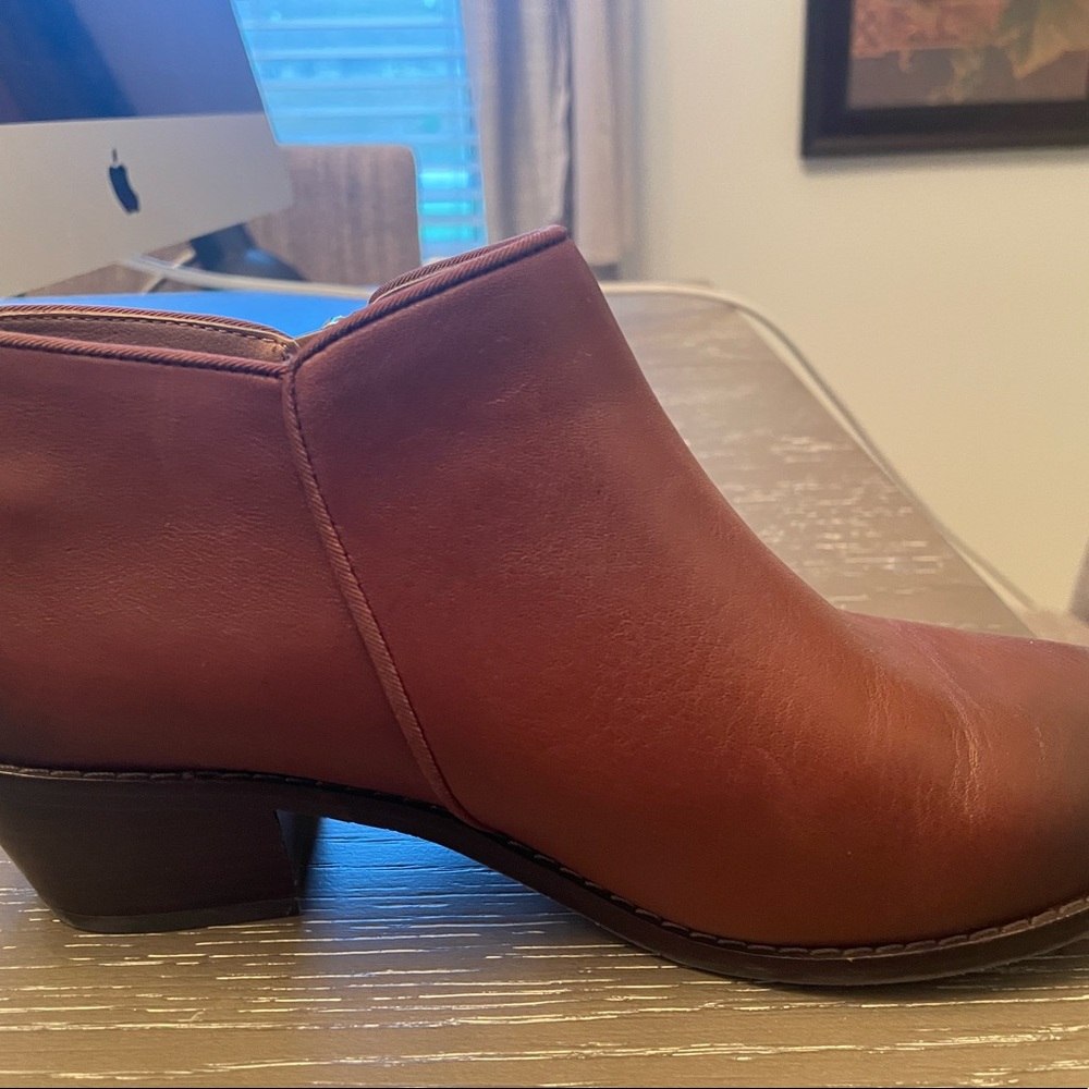 Beautiful Vionic brown leather ankle bootie with side zipper for sale.